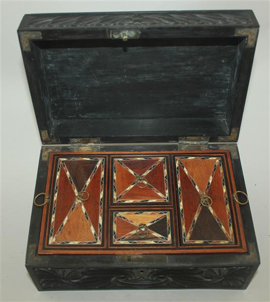 A 19th century Ceylonese carved ebony work box, 9.25in.